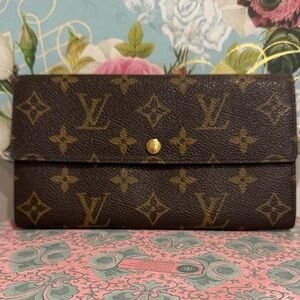 Authentic Louis Vuitton Sarah Monogram Canvas Wallet